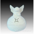 white ceramic angel figurines candle holder